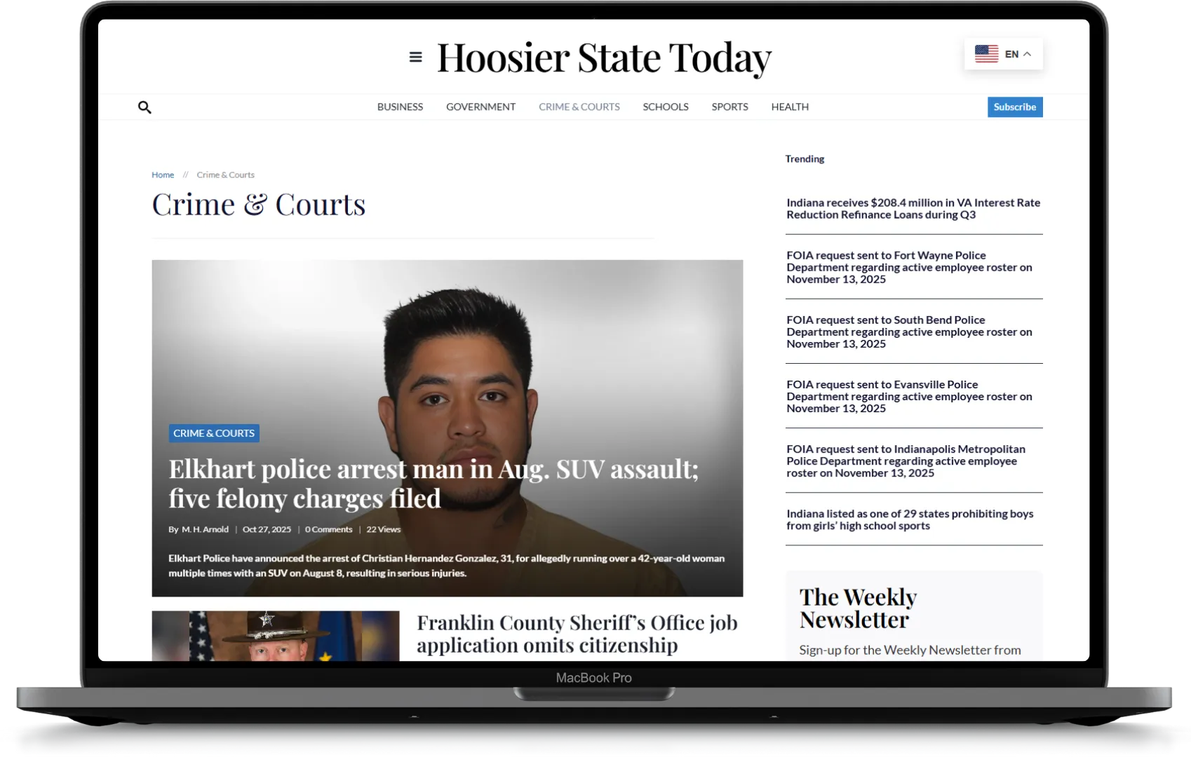 Local news coverage displayed on a laptop